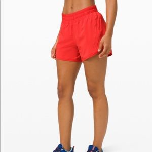 Lululemon TRACK THAT SHORT 5" in Pink Punch